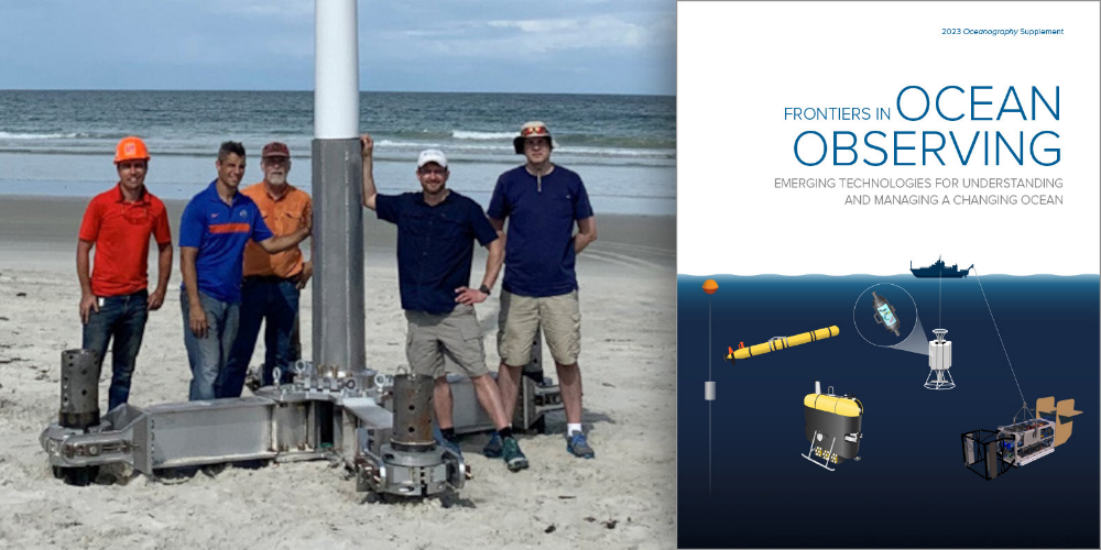 4 men proudly standing on a beach with an ocean sensor device